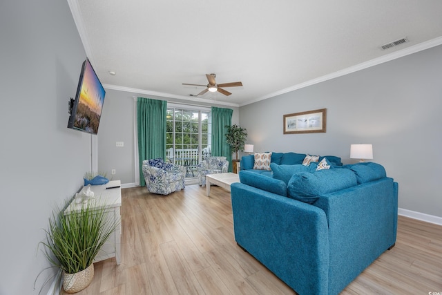 5825 Catalina Dr Unit 125, North Myrtle Beach, SC 29582 - living area featuring ornamental molding, a ceiling fan, and wood finished floors