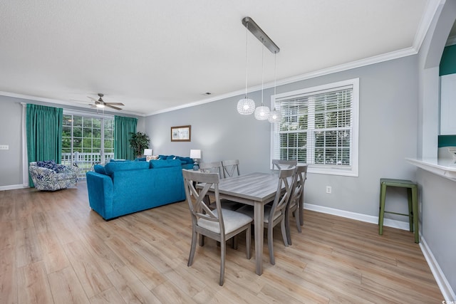 5825 Catalina Dr Unit 125, North Myrtle Beach, SC 29582 - dining room with ornamental molding, light wood-type flooring, and ceiling fan