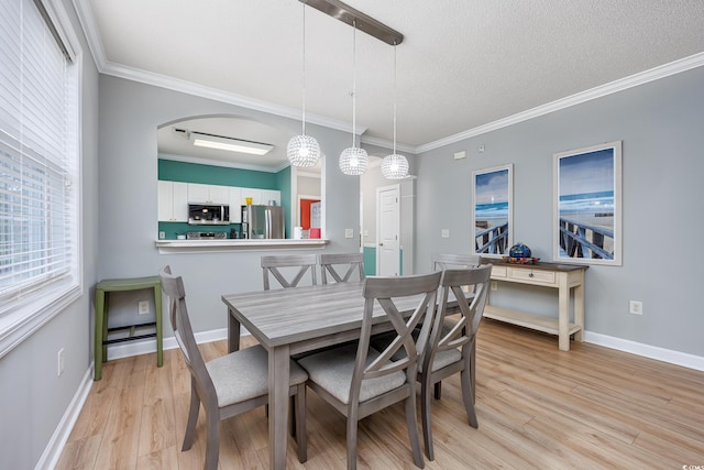 5825 Catalina Dr Unit 125, North Myrtle Beach, SC 29582 - dining area with light wood-style floors and crown molding