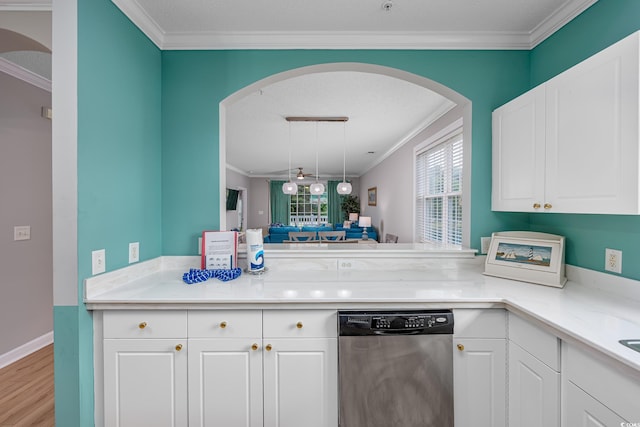 5825 Catalina Dr Unit 125, North Myrtle Beach, SC 29582 - kitchen with stainless steel dishwasher, arched walkways, wood finished floors, crown molding, and white cabinets