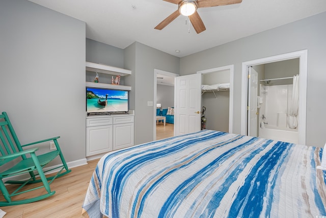 5825 Catalina Dr Unit 125, North Myrtle Beach, SC 29582 - bedroom with light wood finished floors, ensuite bathroom, ceiling fan, and a closet