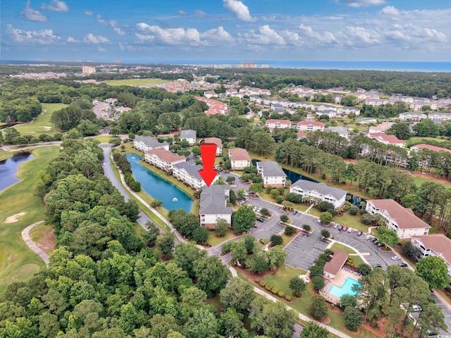 5825 Catalina Dr Unit 125, North Myrtle Beach, SC 29582 - aerial perspective of suburban area featuring a nearby body of water and a golf club