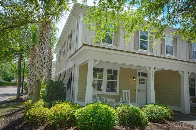 4901 N Market St, North Myrtle Beach, SC 29582 - view of front of property with board and batten siding and covered porch