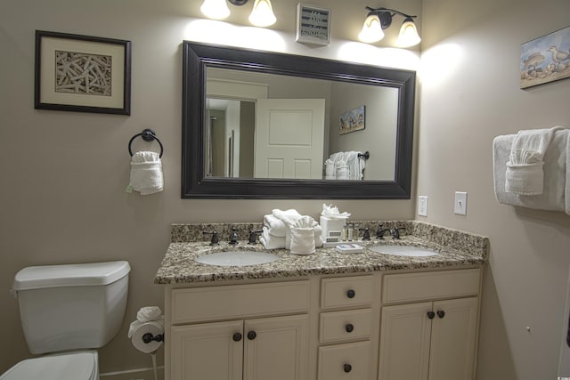 4901 N Market St, North Myrtle Beach, SC 29582 - bathroom with double vanity and toilet
