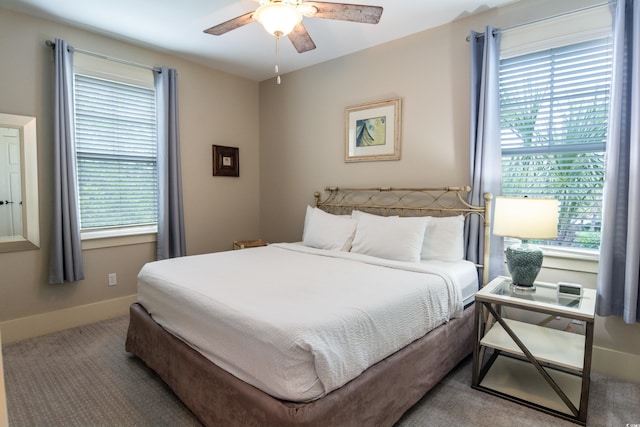 4901 N Market St, North Myrtle Beach, SC 29582 - carpeted bedroom featuring multiple windows and ceiling fan