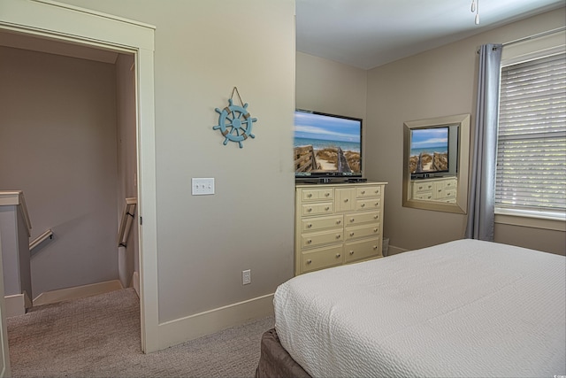 4901 N Market St, North Myrtle Beach, SC 29582 - carpeted bedroom featuring baseboards