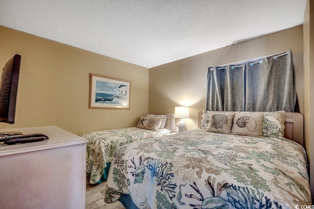9400 Shore Dr Unit 617, Myrtle Beach, SC 29572 - bedroom with wood finished floors
