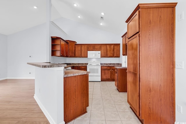 1636 Stuart Square Cir, Myrtle Beach, SC 29577 - kitchen with white appliances, open shelves, brown cabinetry, a peninsula, and high vaulted ceiling