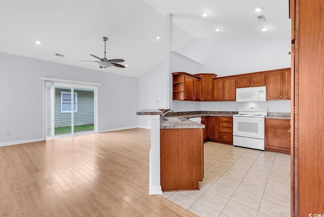 1636 Stuart Square Cir, Myrtle Beach, SC 29577 - kitchen featuring white appliances, open shelves, open floor plan, high vaulted ceiling, and a peninsula