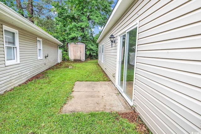 1636 Stuart Square Cir, Myrtle Beach, SC 29577 - view of grassy yard featuring a patio area and a shed