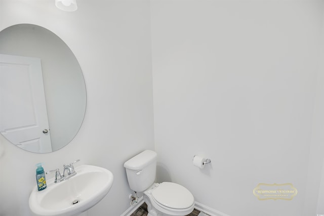 547 Pacific Commons Dr, Surfside Beach, SC 29575 - half bathroom featuring a sink and toilet
