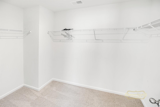 547 Pacific Commons Dr, Surfside Beach, SC 29575 - walk in closet featuring carpet floors