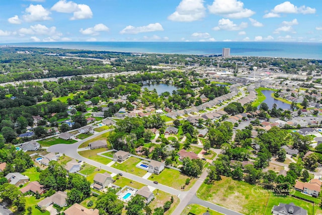 547 Pacific Commons Dr, Surfside Beach, SC 29575 - aerial perspective of suburban area with a large body of water