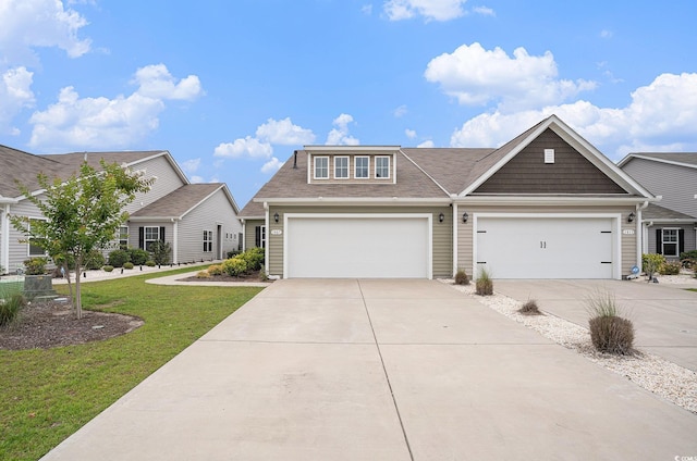 1807 Berkley Village Loop, Myrtle Beach, SC 29579 - view of front facade featuring concrete driveway, a front yard, and a shingled roof
