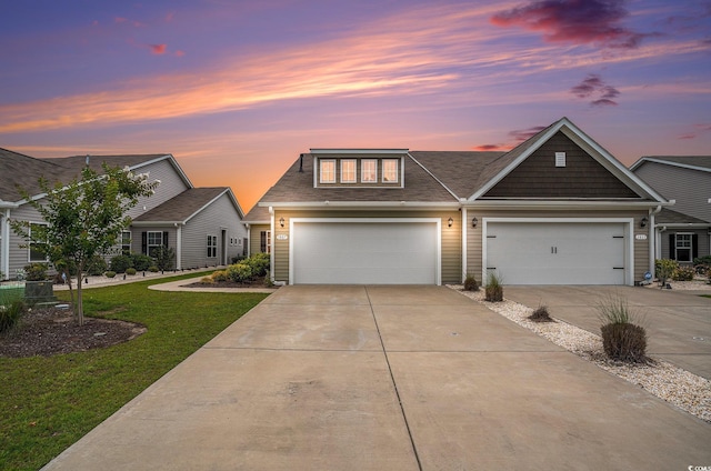 1807 Berkley Village Loop, Myrtle Beach, SC 29579 - view of front facade with driveway, a front yard, a garage, and roof with shingles