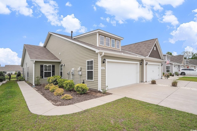 1807 Berkley Village Loop, Myrtle Beach, SC 29579 - view of side of home featuring concrete driveway, a yard, and roof with shingles