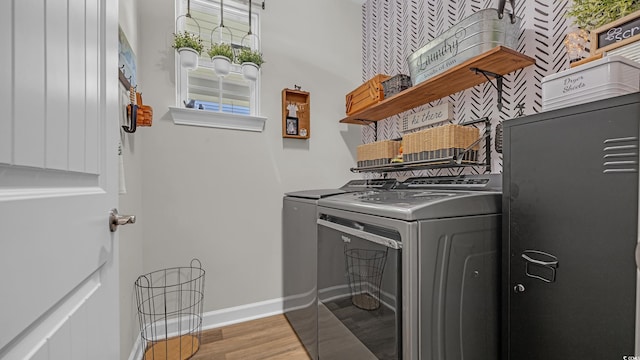 598 Cascade Loop, Little River, SC 29566 - laundry room with washer and clothes dryer and wood finished floors