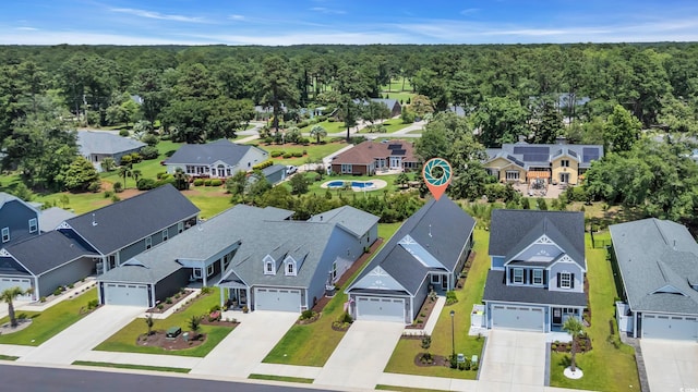 598 Cascade Loop, Little River, SC 29566 - aerial view of residential area featuring a heavily wooded area