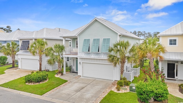 540 Chanted Dr, Murrells Inlet, SC 29576 - beach home featuring a garage, driveway, and a front yard