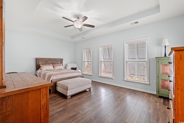540 Chanted Dr, Murrells Inlet, SC 29576 - bedroom featuring a raised ceiling, dark wood-style floors, and ceiling fan