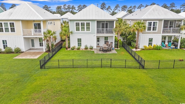 540 Chanted Dr, Murrells Inlet, SC 29576 - rear view of property with a patio, a balcony, and a fenced backyard