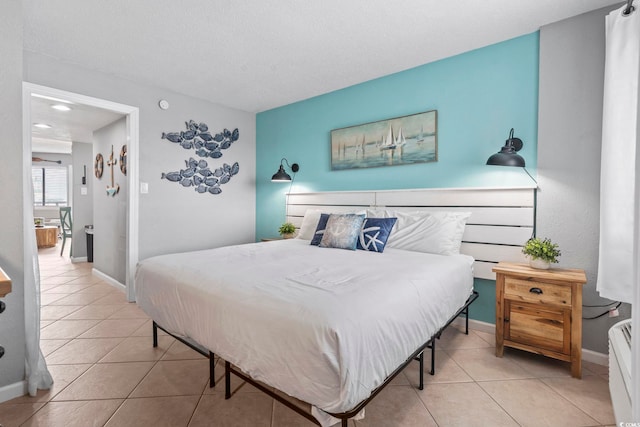 2001 S Ocean Blvd Unit 1408, Myrtle Beach, SC 29577 - tiled bedroom with baseboards