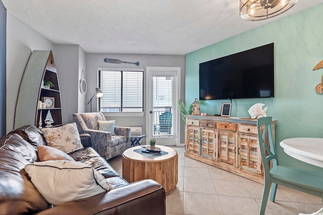 2001 S Ocean Blvd Unit 1408, Myrtle Beach, SC 29577 - living room with a textured ceiling and light tile patterned floors