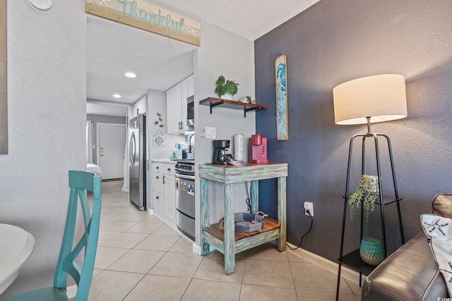 2001 S Ocean Blvd Unit 1408, Myrtle Beach, SC 29577 - corridor featuring light tile patterned flooring, recessed lighting, and a textured wall