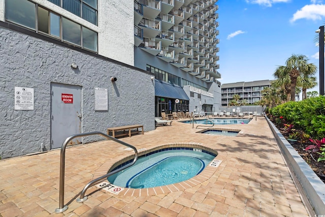 2001 S Ocean Blvd Unit 1408, Myrtle Beach, SC 29577 - community pool with a community hot tub and a patio