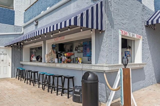 2001 S Ocean Blvd Unit 1408, Myrtle Beach, SC 29577 - view of patio / terrace featuring a bar