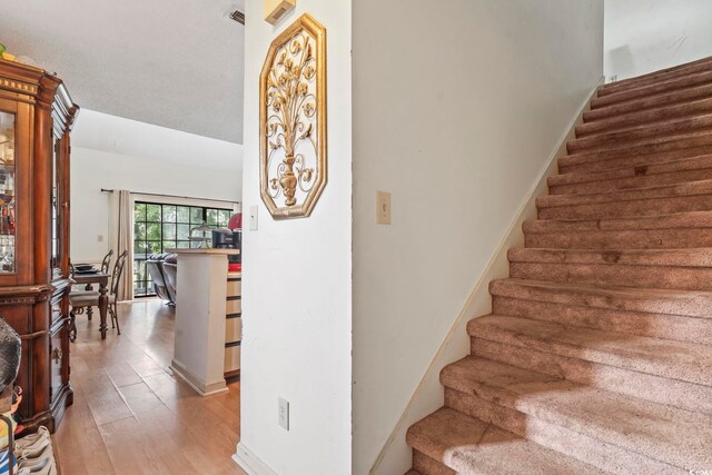 4344 Spa Dr Unit 605, Little River, SC 29566 - staircase with wood finished floors