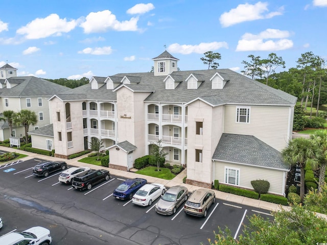 1009 World Tour Blvd Unit 105, Myrtle Beach, SC 29579 - view of property featuring uncovered parking