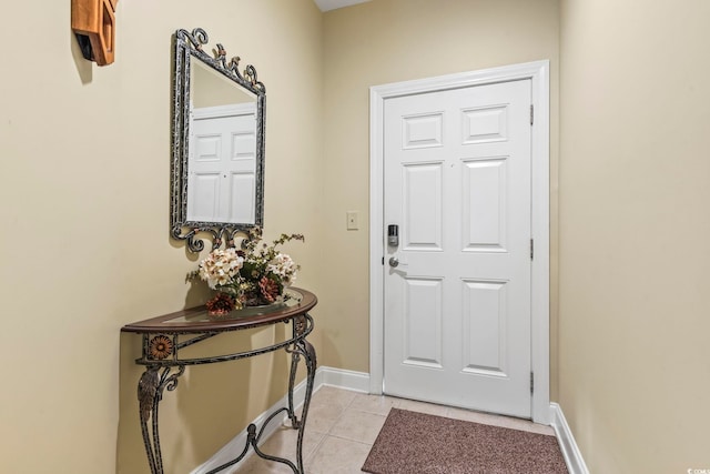 1009 World Tour Blvd Unit 105, Myrtle Beach, SC 29579 - doorway with light tile patterned floors and baseboards