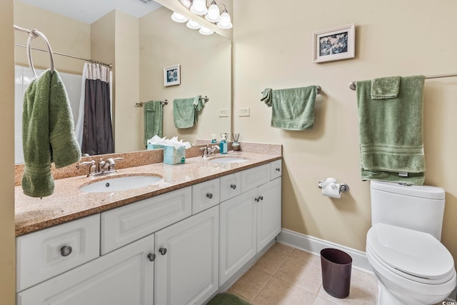 1009 World Tour Blvd Unit 105, Myrtle Beach, SC 29579 - bathroom featuring double vanity, tile patterned flooring, and a shower with shower curtain