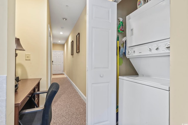 1009 World Tour Blvd Unit 105, Myrtle Beach, SC 29579 - washroom featuring stacked washing machine and dryer, carpet flooring, an office area, and recessed lighting