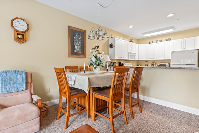 1009 World Tour Blvd Unit 105, Myrtle Beach, SC 29579 - dining room with a chandelier, recessed lighting, and carpet flooring