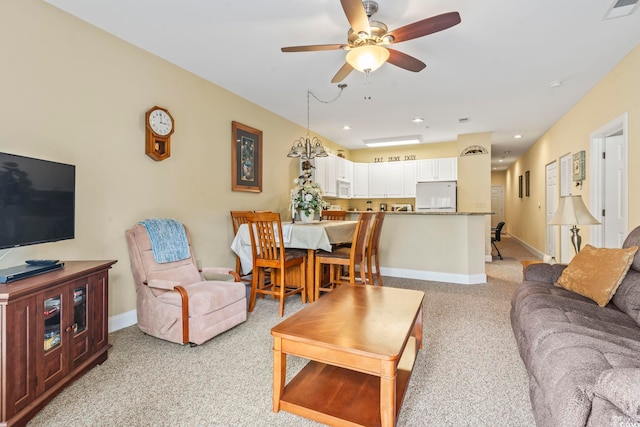 1009 World Tour Blvd Unit 105, Myrtle Beach, SC 29579 - living area featuring ceiling fan, light colored carpet, and recessed lighting