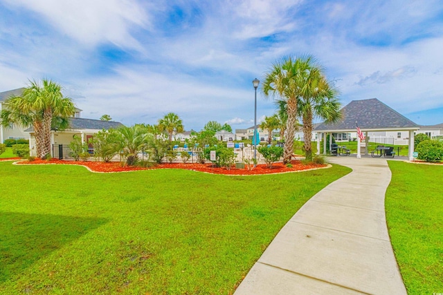 2060 Cross Gate Blvd Unit 102, Surfside Beach, SC 29575 - view of community featuring a lawn and a gazebo