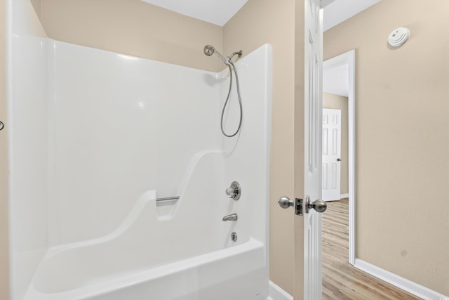 131 Pine Lake Cir, Ocean Isle Beach, NC 28469 - full bath featuring bathtub / shower combination and wood finished floors