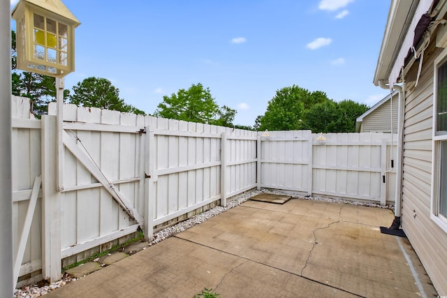 131 Pine Lake Cir, Ocean Isle Beach, NC 28469 - view of patio featuring a gate