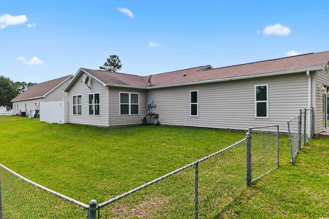 131 Pine Lake Cir, Ocean Isle Beach, NC 28469 - rear view of property featuring a fenced backyard