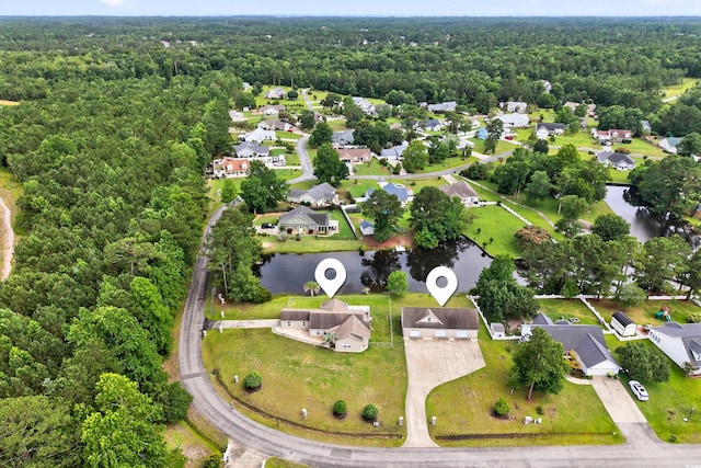131 Pine Lake Cir, Ocean Isle Beach, NC 28469 - aerial view of property's location featuring a heavily wooded area and nearby suburban area