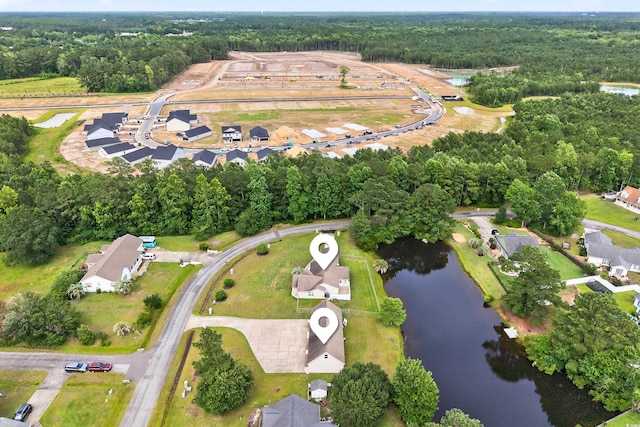 131 Pine Lake Cir, Ocean Isle Beach, NC 28469 - aerial overview of property's location featuring a nearby body of water and a forest