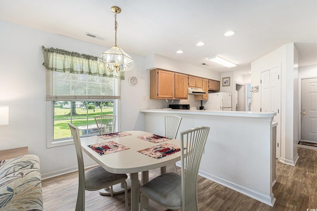 537 White River Dr Unit 17C, Myrtle Beach, SC 29579 - dining room with wood finished floors, a chandelier, and recessed lighting
