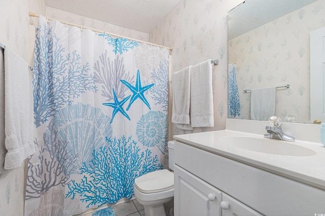 537 White River Dr Unit 17C, Myrtle Beach, SC 29579 - bathroom featuring wallpapered walls, vanity, a textured ceiling, tile patterned floors, and curtained shower
