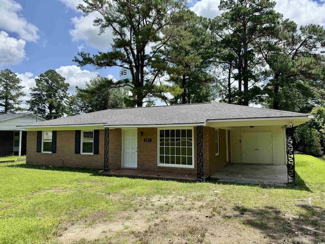 109 S Maple Ave, Andrews, SC 29510 - single story home featuring a front lawn and brick siding