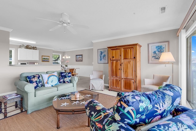 140 S Cove Pl Unit 6C, Pawleys Island, SC 29585 - living area featuring carpet floors, ornamental molding, a ceiling fan, and a chandelier