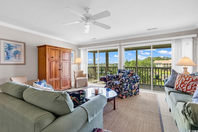 140 S Cove Pl Unit 6C, Pawleys Island, SC 29585 - living room with ceiling fan, ornamental molding, a textured ceiling, and light colored carpet