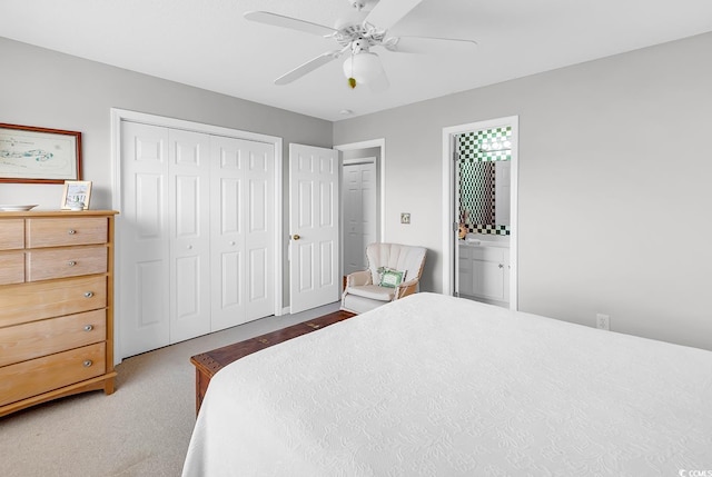 140 S Cove Pl Unit 6C, Pawleys Island, SC 29585 - bedroom with light colored carpet, a closet, ceiling fan, and connected bathroom