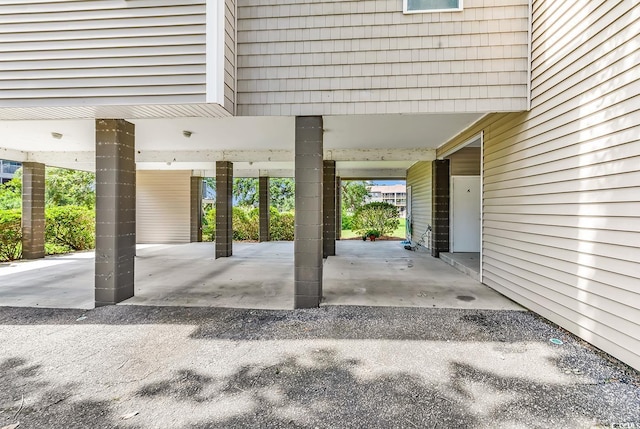 140 S Cove Pl Unit 6C, Pawleys Island, SC 29585 - garage with a carport